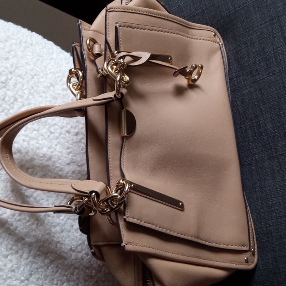 Coach purse with dust bag.